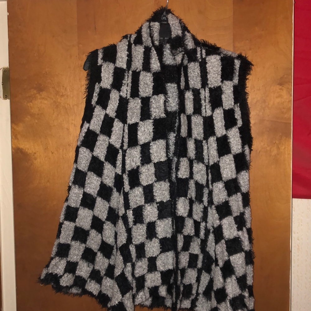 Black and white vest